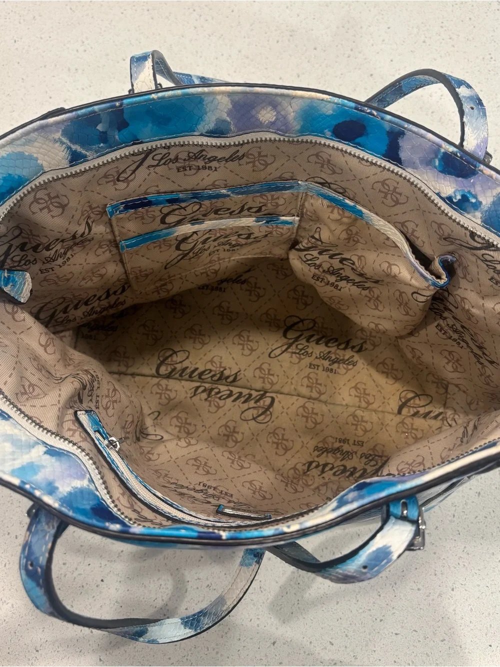 GUESS Blue & White Floral-Print Snakeskin-Textured Tote with Silver Charm